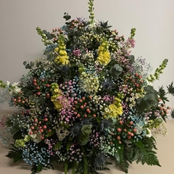 Centro de flores de colores - Imagen 1